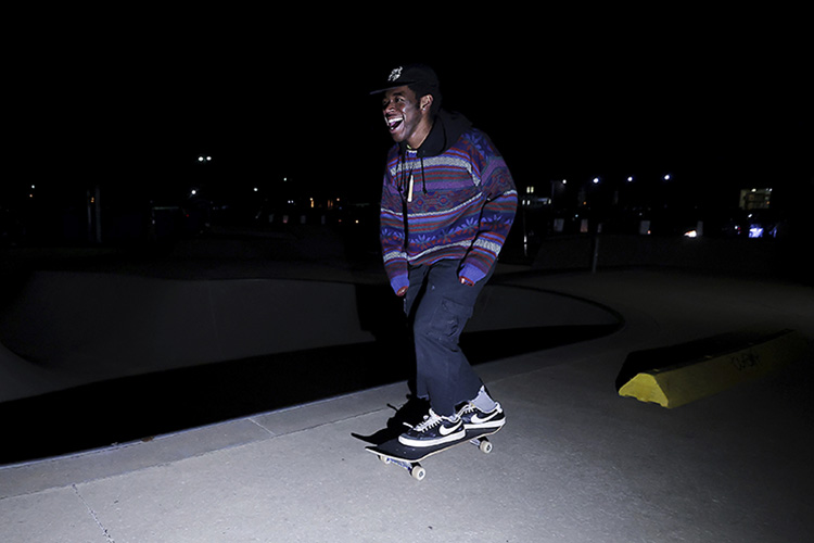 a man on a skateboard at night