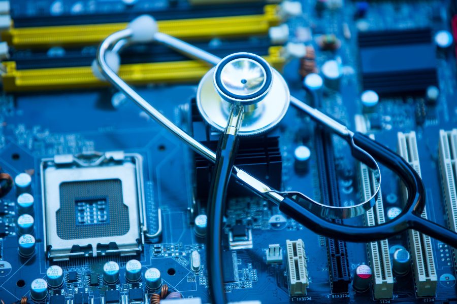 image of stethoscope on a computer motherboard