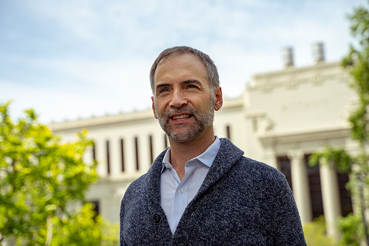 Gabriel Lenz, professor of political science, standing on campu