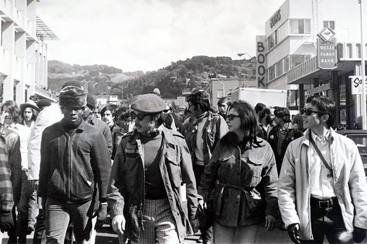 marchers in a black and white photograph