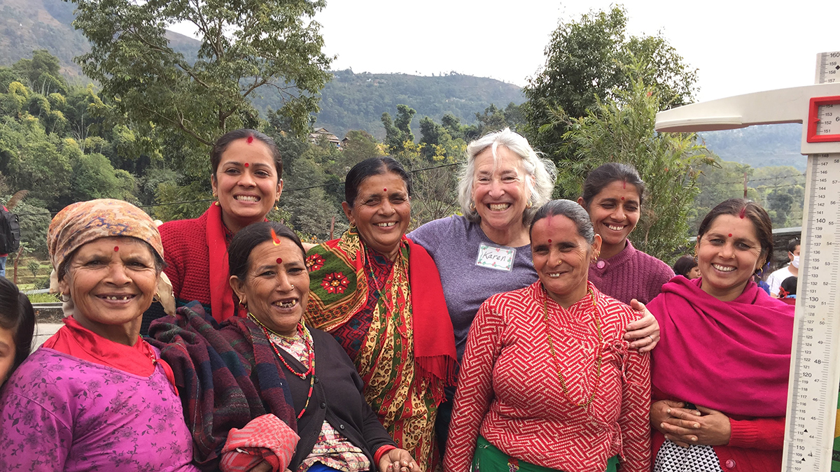 Karen Sokal-Gutierrez with women in rural Nepal