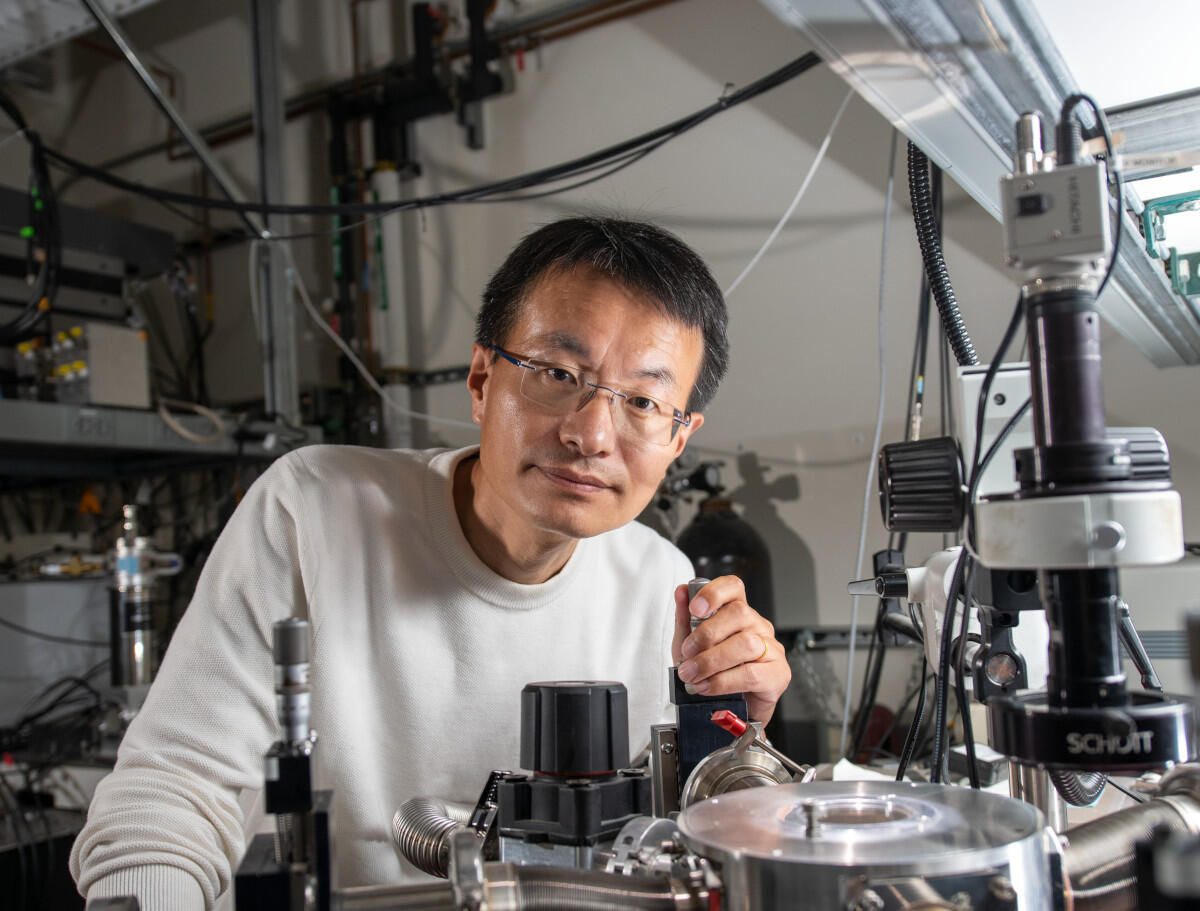 alt="Peidong Yang at a probe station in his lab at Hildebrand Hall on the UC Berkeley campus."