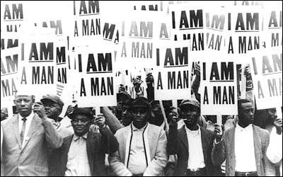 Protestors in 1968 hold signs saying 'I am A man'.