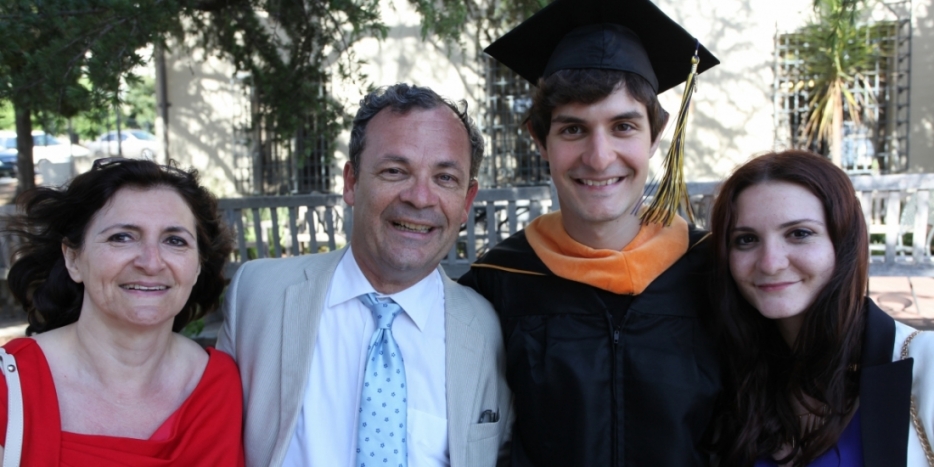 Thibault Duchemin, pictured here at commencement with his family, has designed a mobile app that offers real-time captioning for deaf users. Photo by Aaron Walburg