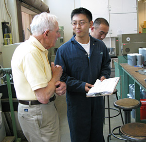 Three researchers in a lab.