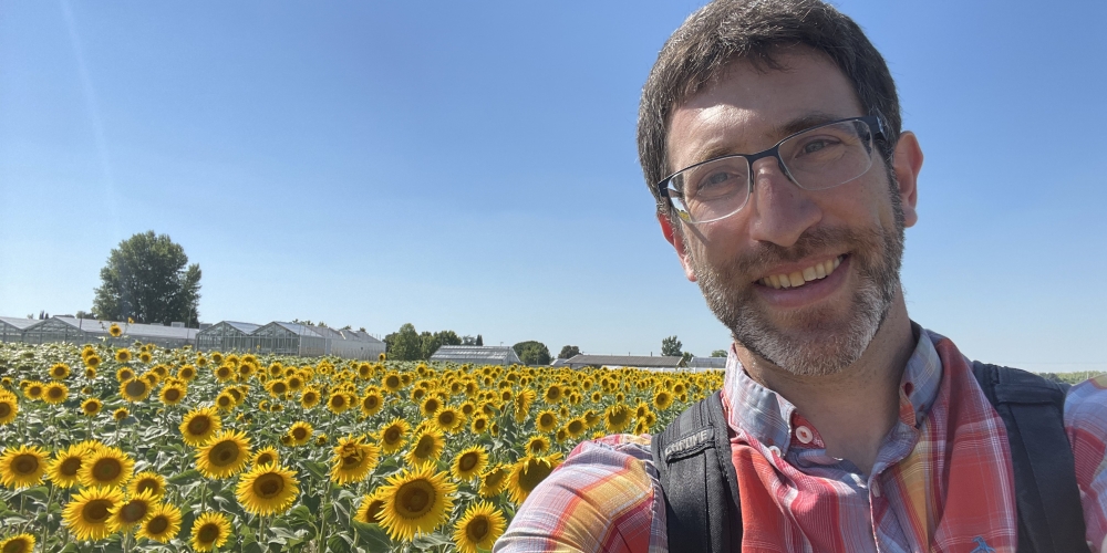 Professor Blackman in the field with sunflowers