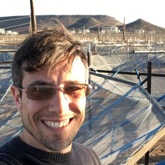 Aaron Parsons in front of the Hydrogen Epoch of Reionization Array in South Africa