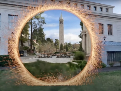 Screenshot from video showing a building on UC Berkeley campus with a ring of fire in the middle of the shot containing another view of campus