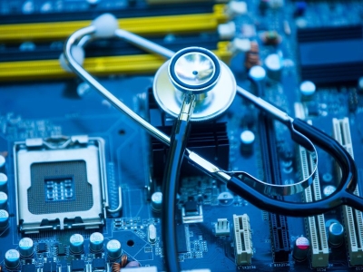 image of stethoscope on a computer motherboard