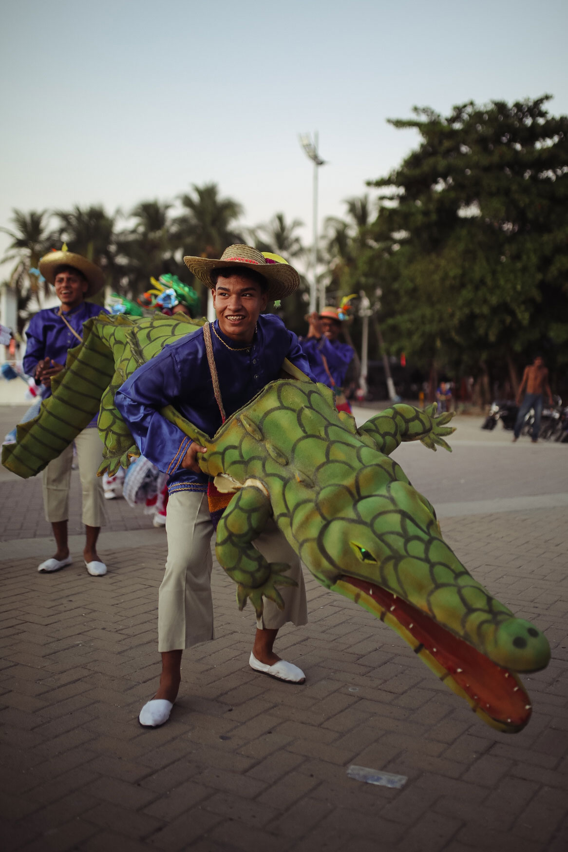 Two Caribbean residents in the Carnival of Barranquilla (2023) dancing and dressed as the American crocodyle (Crocodylus acutus). This species plays a very important role in culture, with many songs being written about it. Photo by: Robinson Manuel Ruz Sampayo