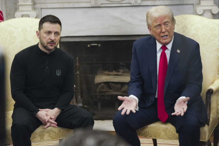 Ukrainian president Zelensky is seated next to President Trump