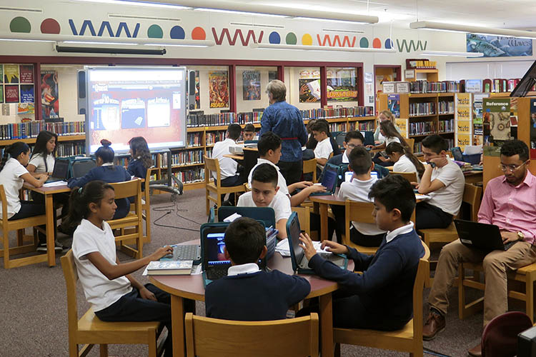 latino students study in a classroom