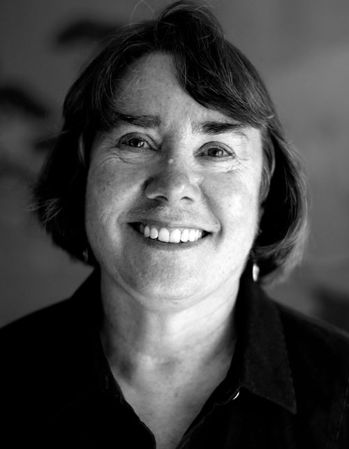 informal headshot of Bonnie Morris, in black and white 