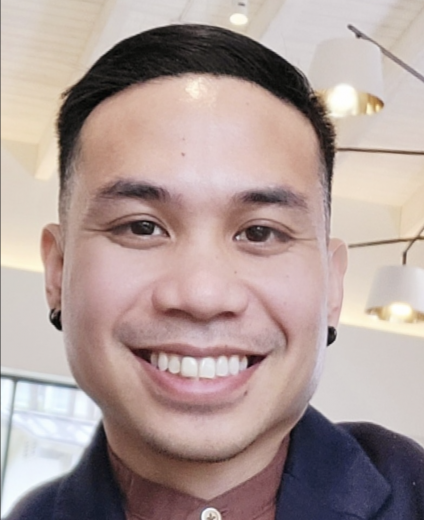 headshot of man smiling