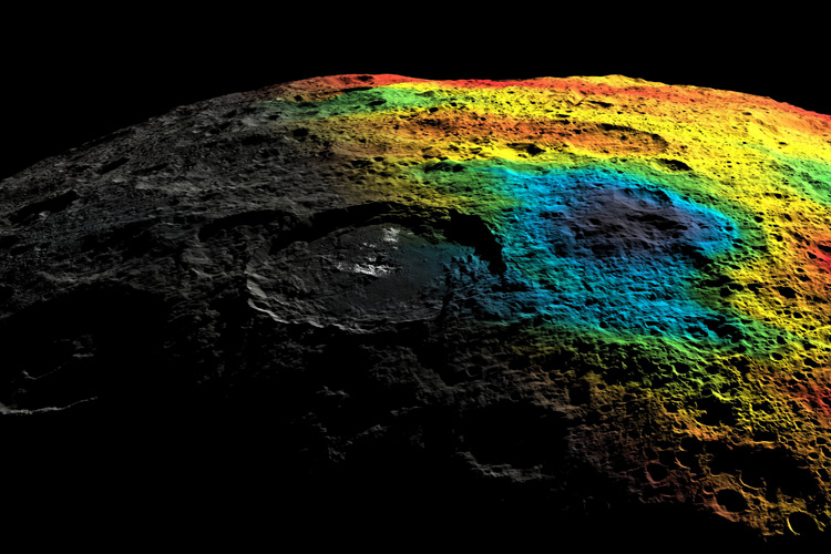 photo of dwarf planet Ceres with craters and rainbow colors