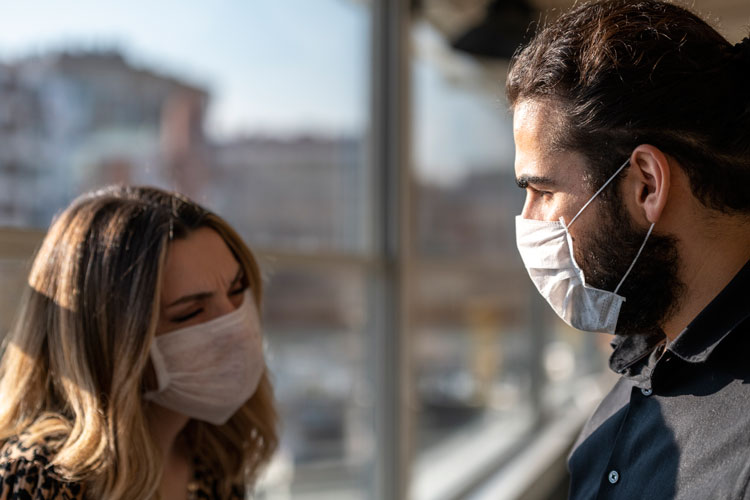 couple wearing masks during coronavirus pandemic