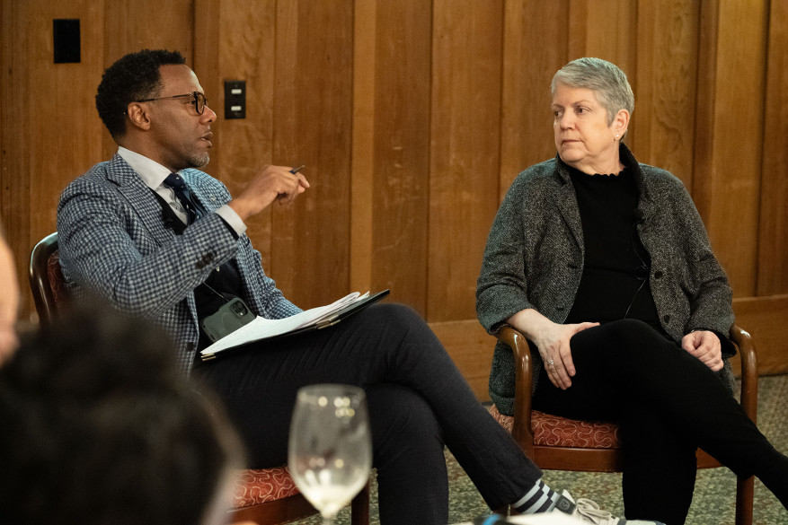 image of man and woman sitting in chairs talking to each other