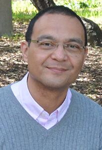 headshot of man in glasses 