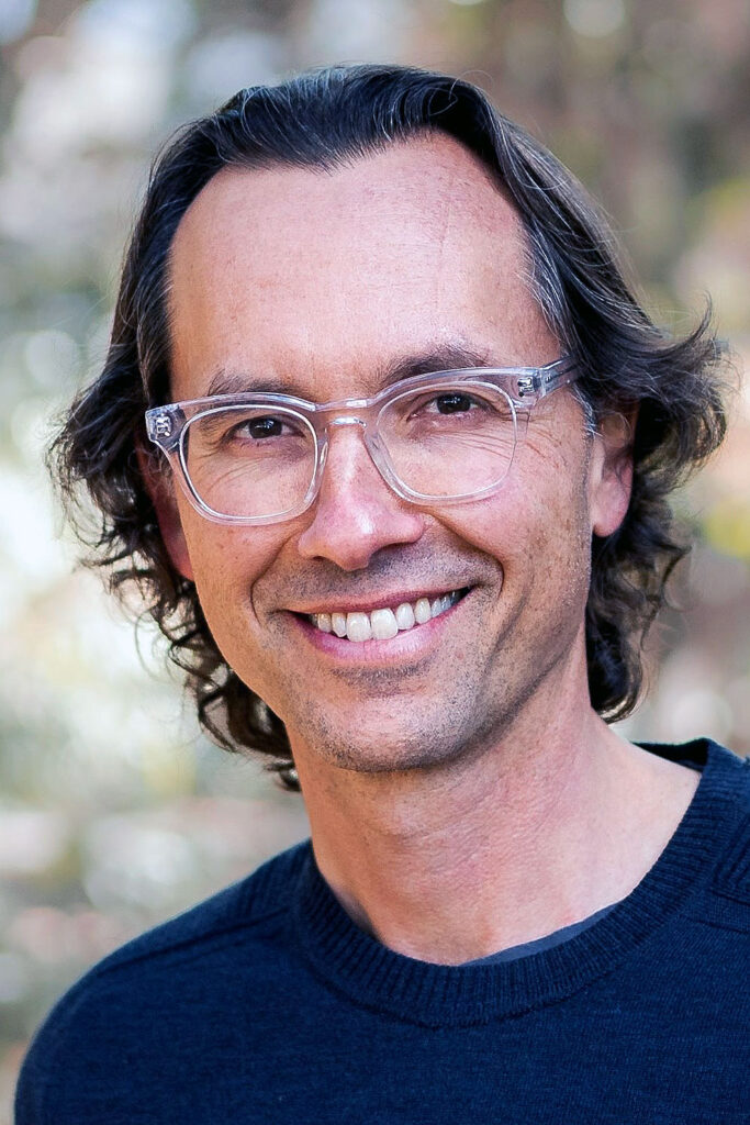 image of headshot of man smiling