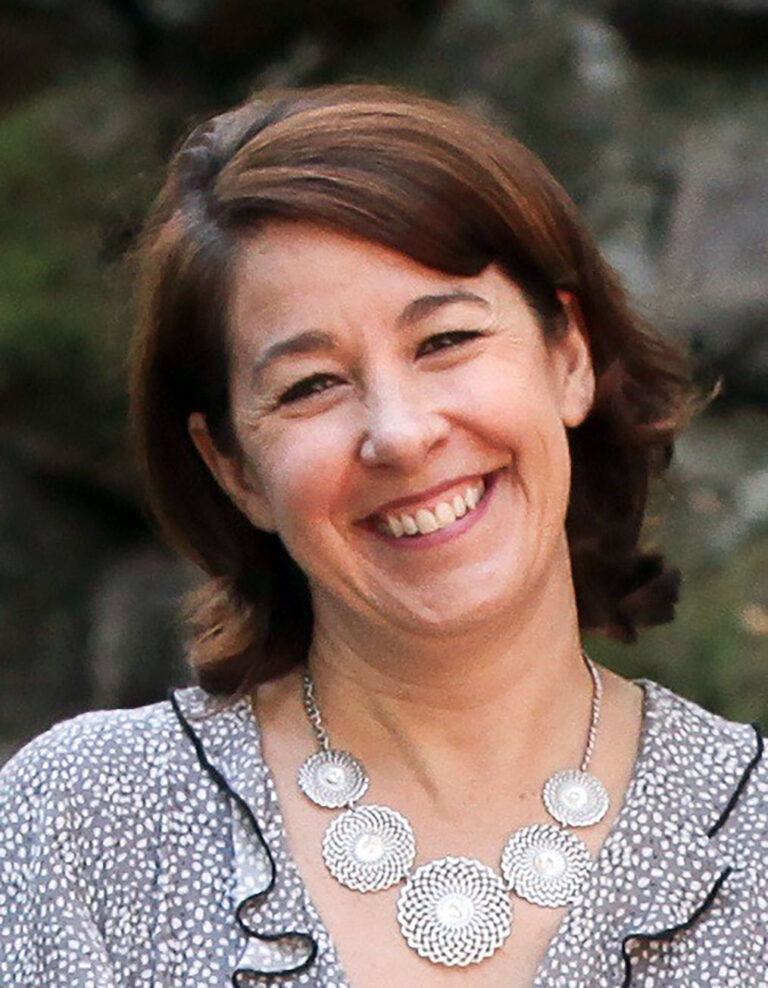 image of headshot of woman smiling