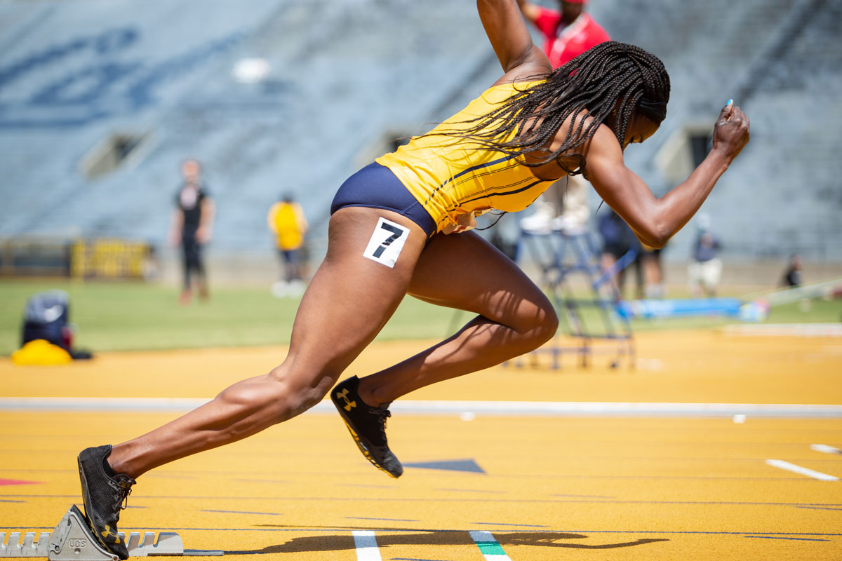 Cal Track and Field sprinter Ezinne Abba in a sprinting stance