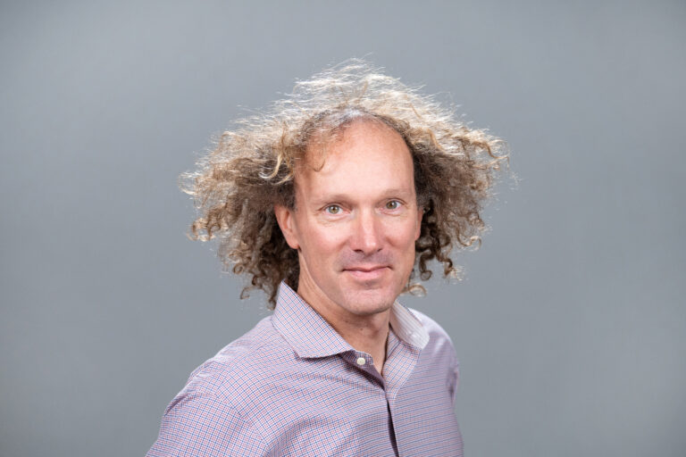 img of man looking and smiling at camera