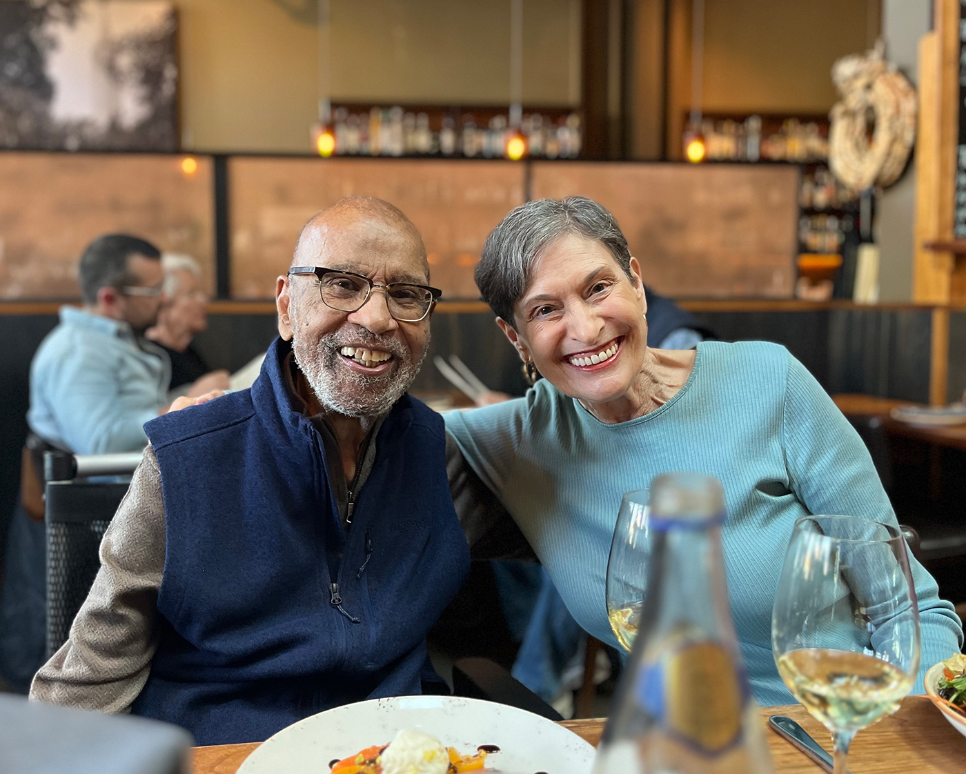 Henderson and Colleen Haas in a restaurant together