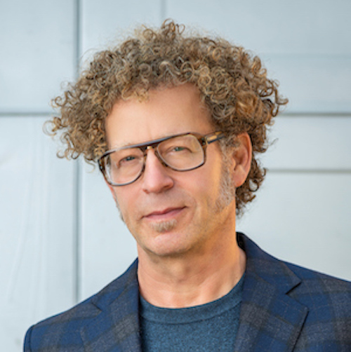 headshot of man in glasses 