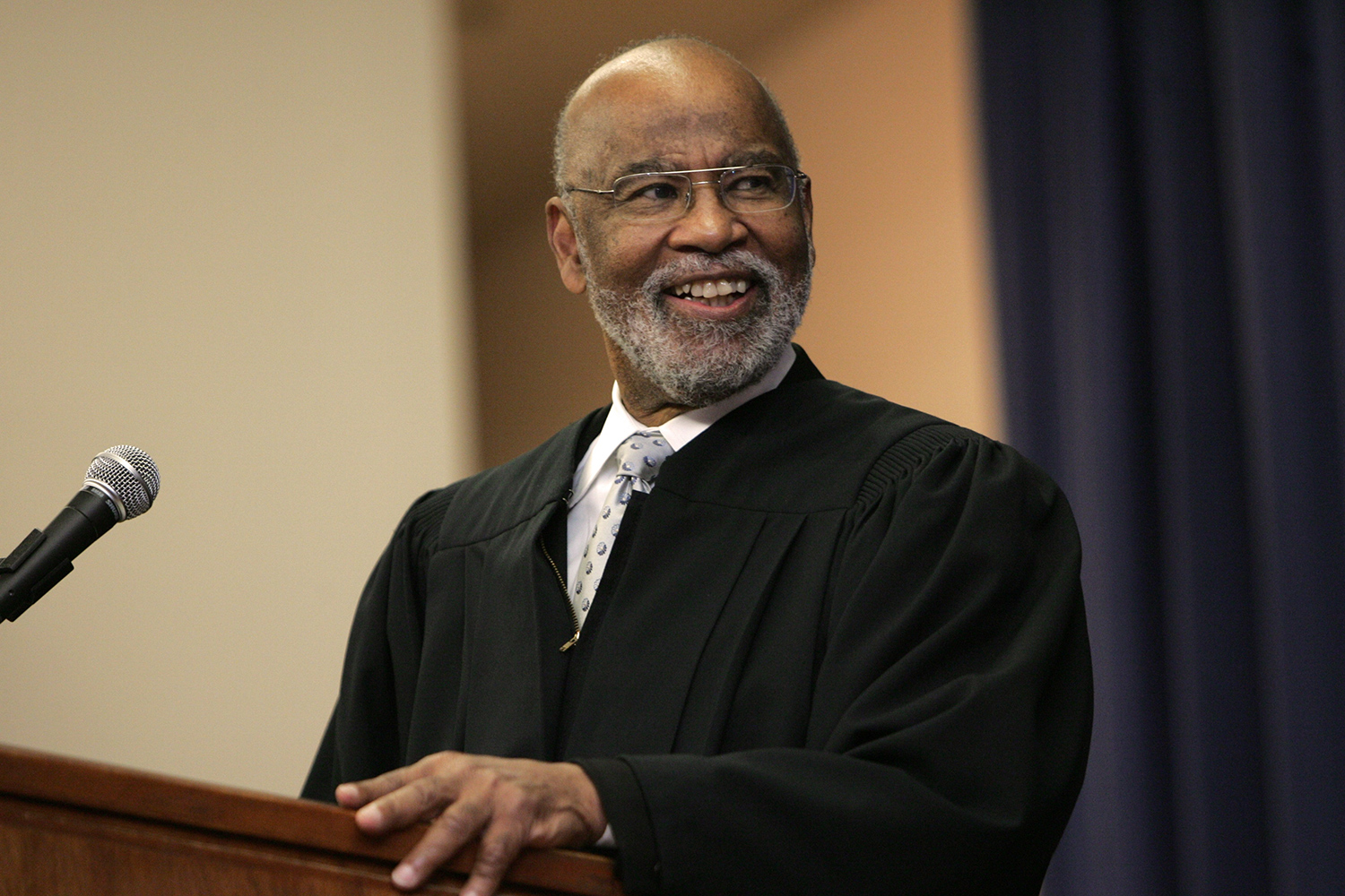 Thelton Henderson at podium
