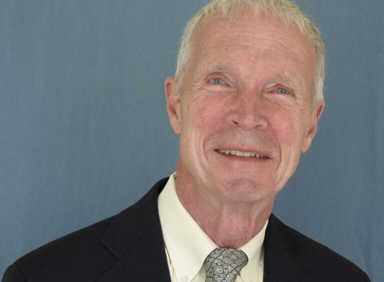 image of headshot of man smiling