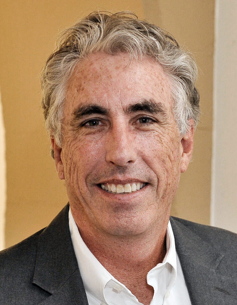 headshot of man smiling