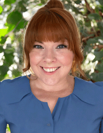 headshot of Lindsay Maple, in a blue shirt and smiling. Maple is deputy director of research for California 100