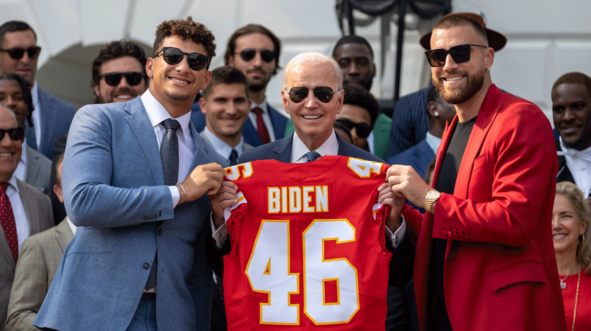 Flanked by Kansas City Chiefs stars Patrick Mahomes (left) and Travis Kelce (right), President Joe Biden celebrated the Chiefs Super Bowl win last year at the White House