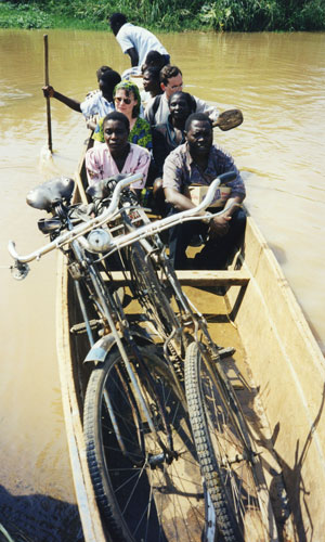 Ted Miguel in canoe during the El Nino floods in Kenya in 1998, the first year of the deworming project.