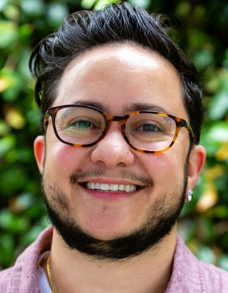 headshot of man smiling