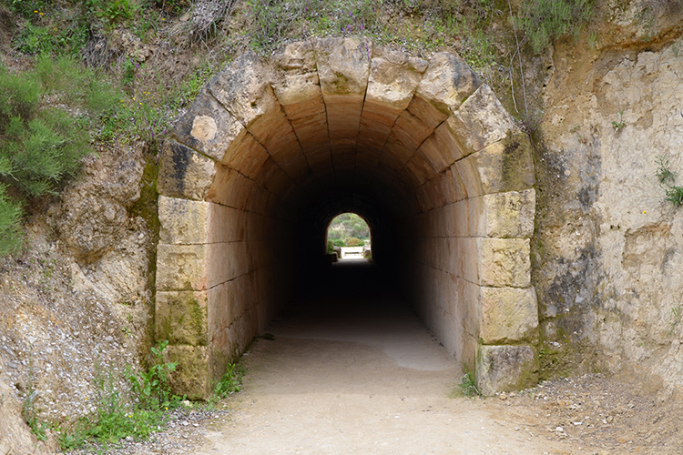 The entrance tunnel to the track used by athletes at the ancient Panhellenic Games 