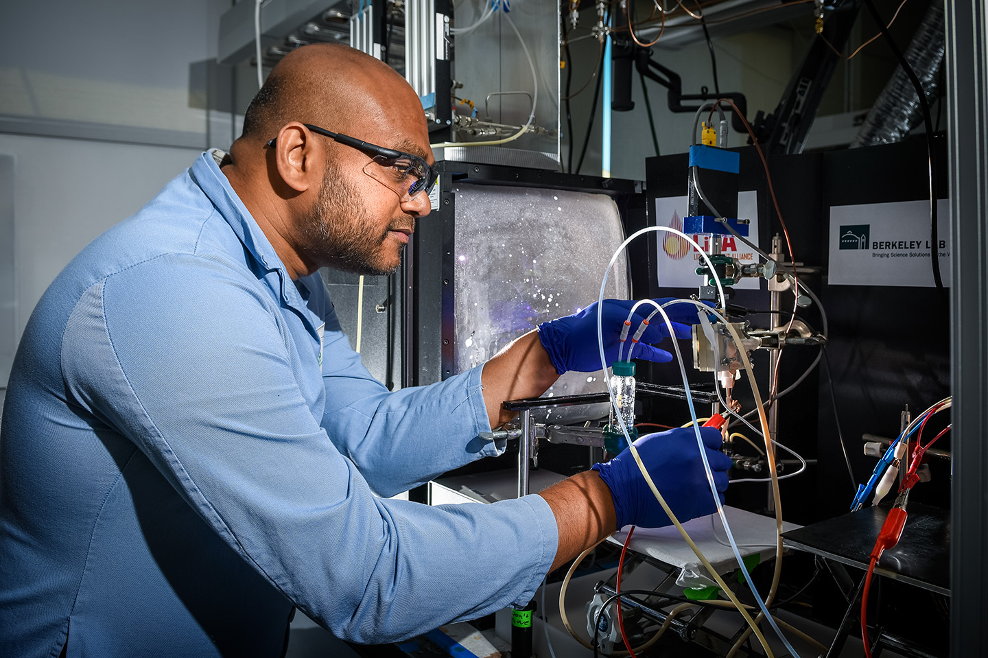 image of man using a laboratory device in the laboratory