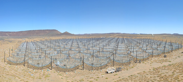 hundreds of small dish-shaped antennae sitting in a desert