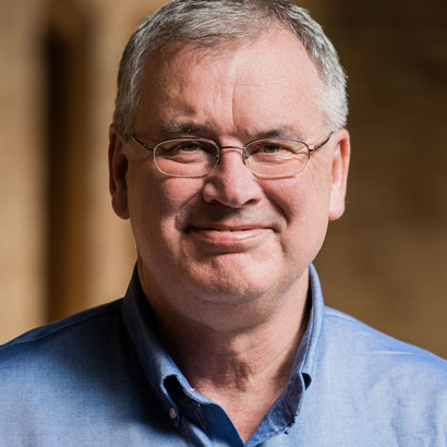 a smiling Steve Conolly in a blue shirt