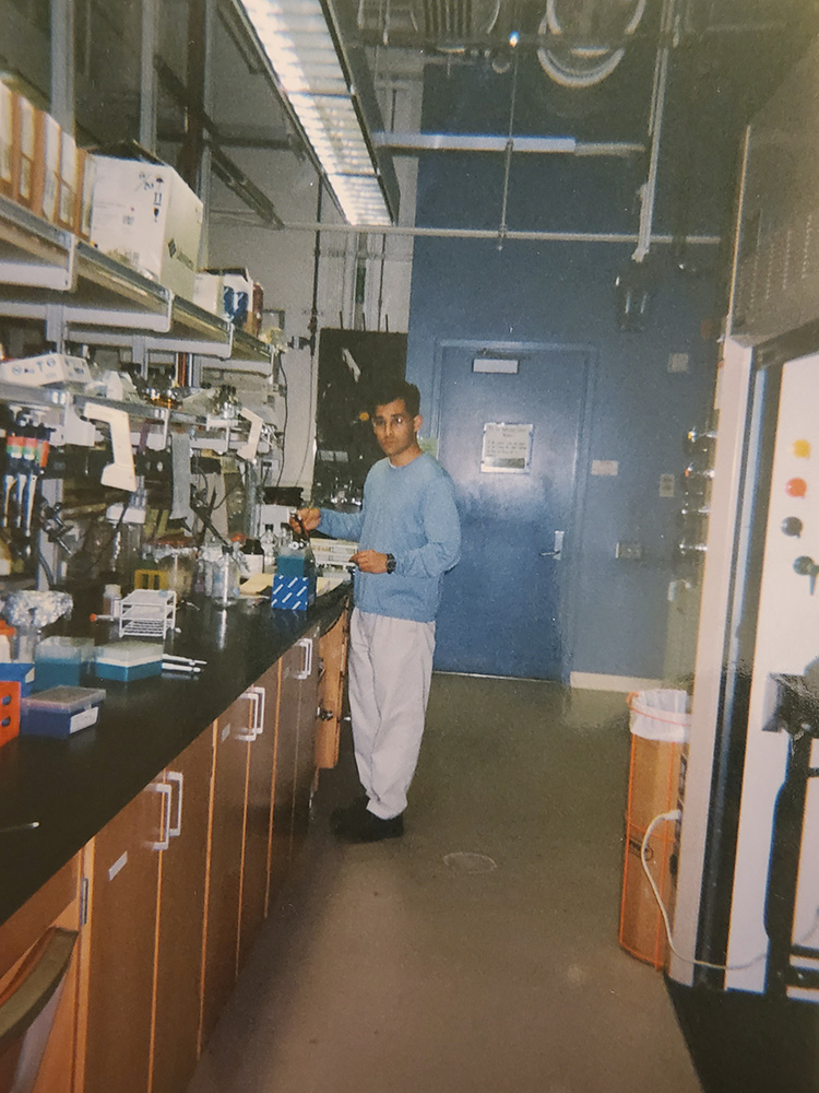 Archival photo of David Schaffer conducting experiments in a lab