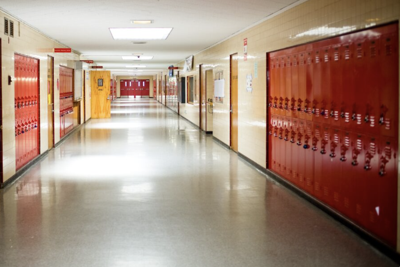 an image of an empty school hallway with lockers