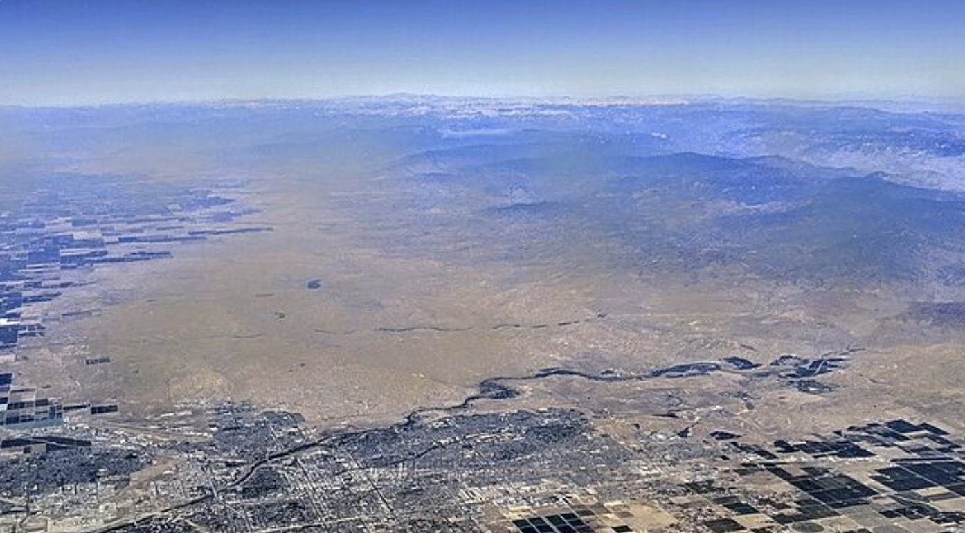 Aerial view of Bakersfield, California, and vicinity, showing the Kern River and the southern Sierra Nevadas