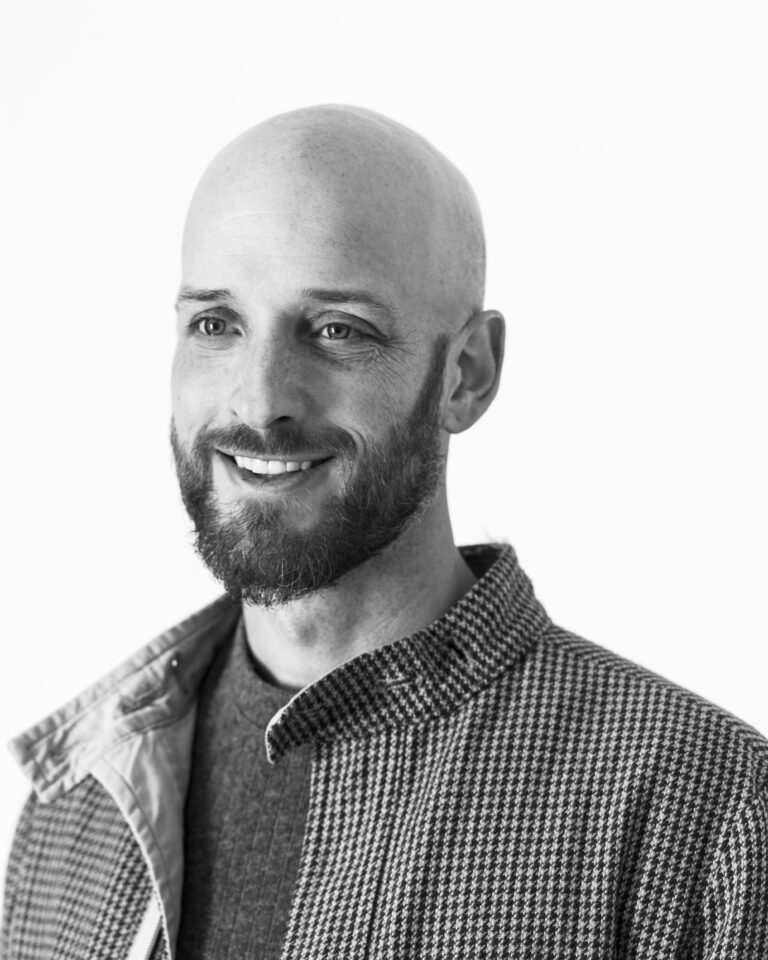 headshot of man smiling