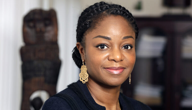 An informal headshot of Cina Lawson, leader of Togo's Ministry of Digital Economy and Digital Transformation