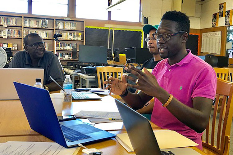 Travis Bristol, a faculty member at the UC Berkeley Graduate School of Education, meets with members of the Compton Male Teacher of Color Network in Southern California.