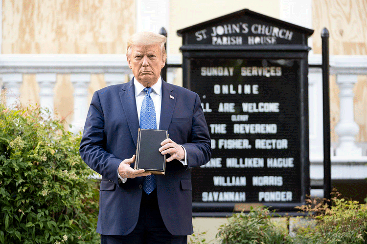Then-President Donald Trump holds a Bible and glowers outside of St. John's Episcopal Church in Washington, D.C.