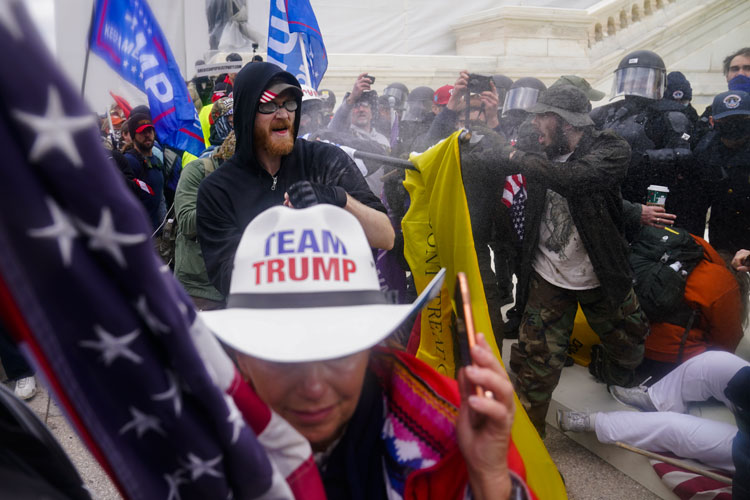 Trump supporters trying to break through police barrier at U.S. Capitol on Jan. 6