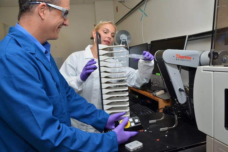 scientists in drug discovery center