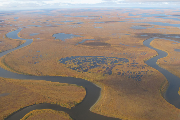 Yana river region, rivers shooting through pieces of land