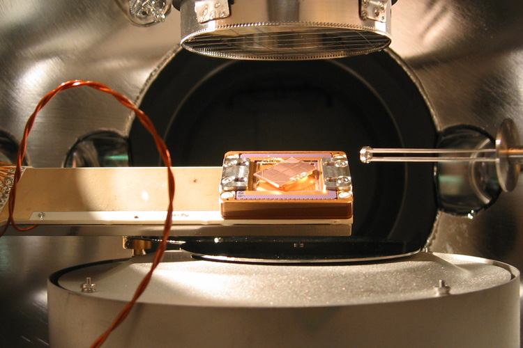calcium ions are trapped inside this vacuum chamber